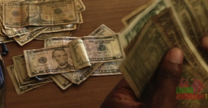 Dirty-Money-Zimbababwe-US-Dollar-Bills